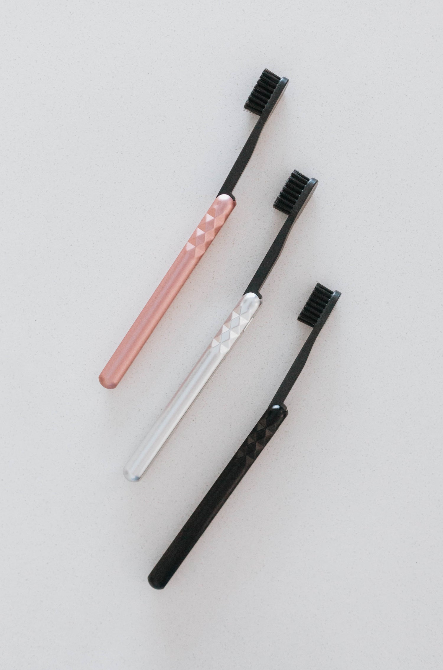 Starter Kit Aluminum Brush Handle and Biodegradable Brush presented in Rose Gold, Silver, and Black